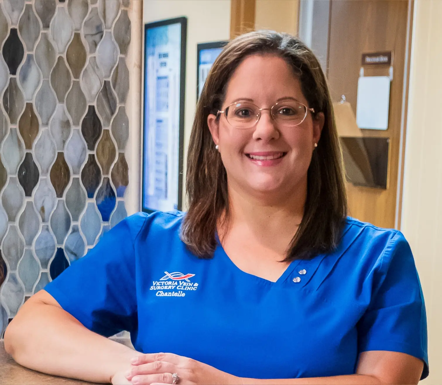 Smiling nurse Chantelle at Victoria Vein Clinic.