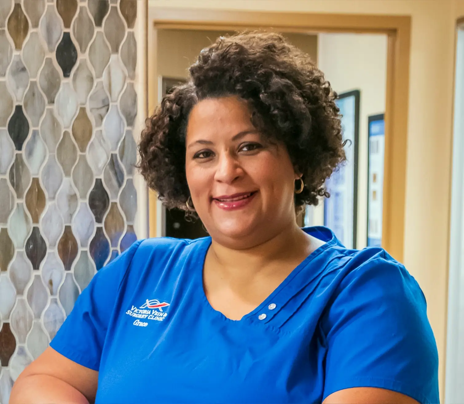 Smiling nurse Grace at Victoria Vein Clinic.